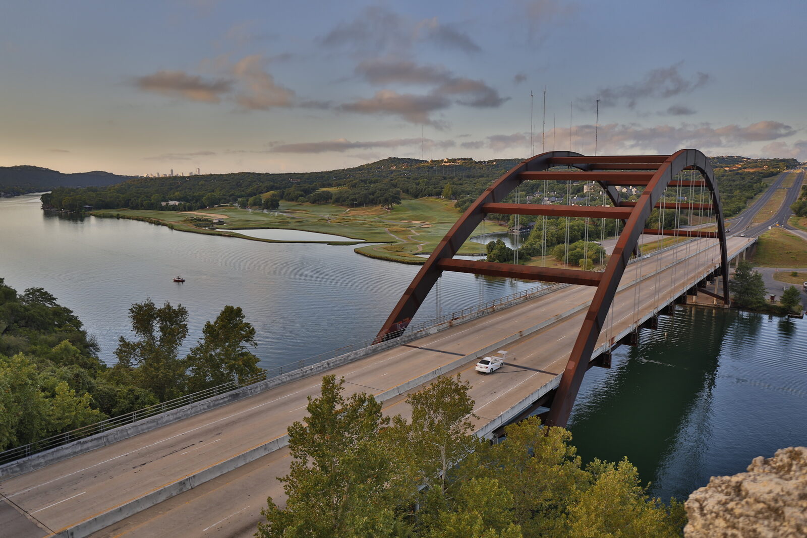 The Pennybacker (360) Bridge arching over Lake Austin in the Hill Country